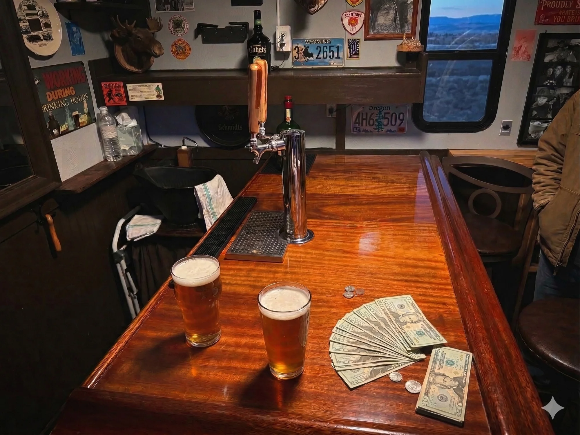 Cash and beers on the bartop in Jacks Wagon