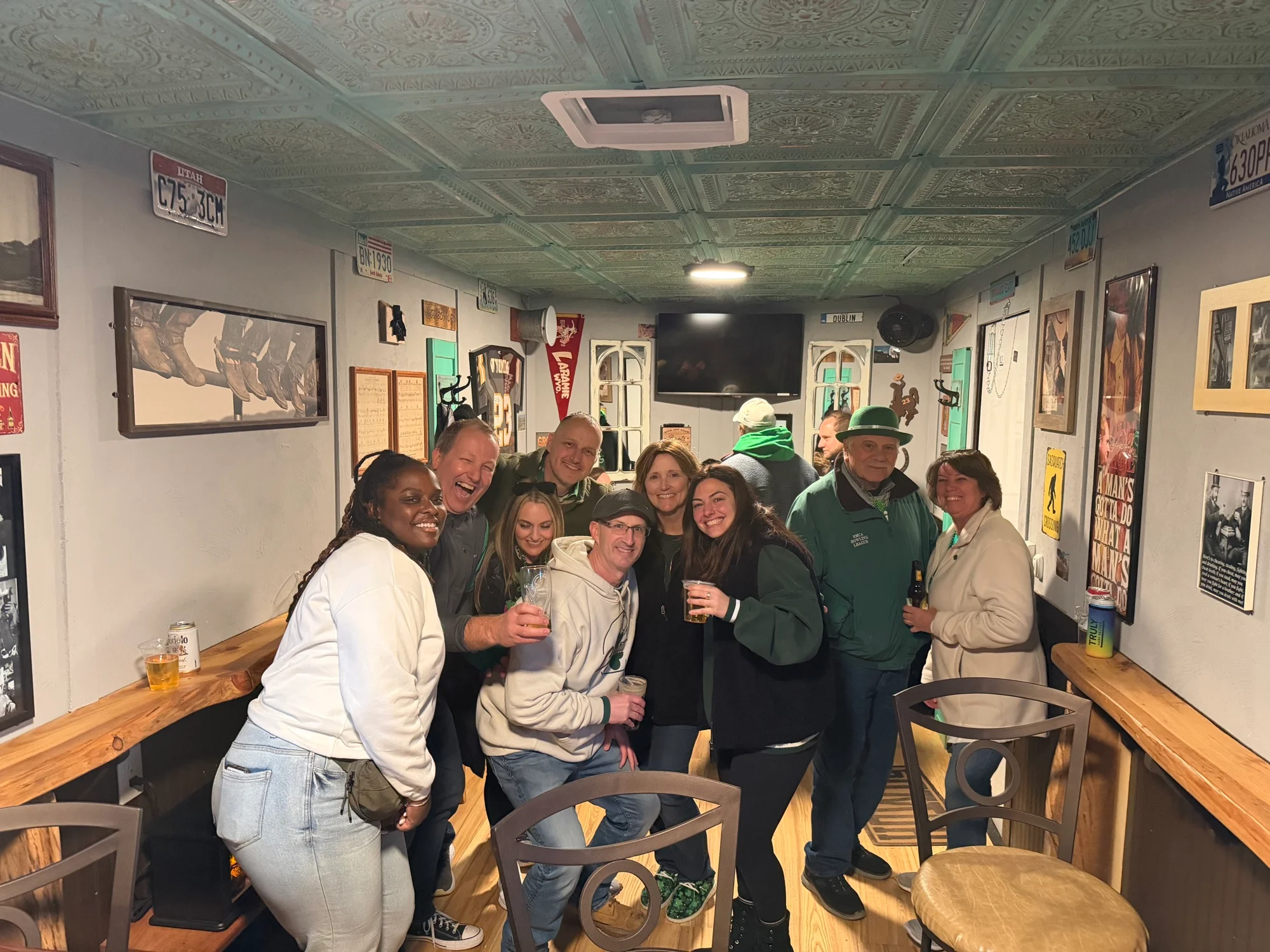 Crowd gathering for a group photo in Jack's Wagon