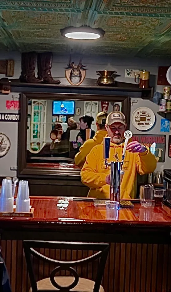 Patron pouring themselves a pint in Jack's Wagon